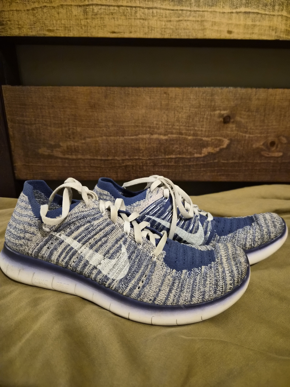 Nike Flyknit Sneakers in Navy and White With Minimal Silver Shimmer